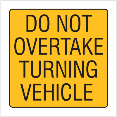 DO NOT OVERTAKE TURNING VEHICLE